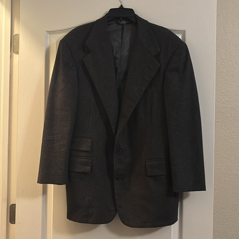 Polo Ralph Lauren good condition with a small tear on the sleeve